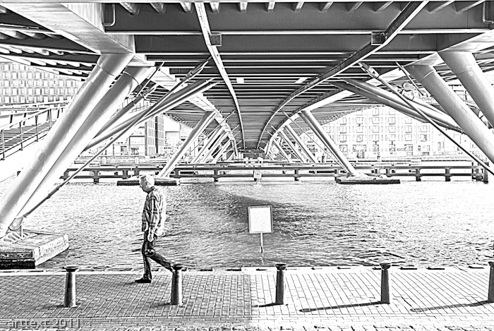 man under bridge